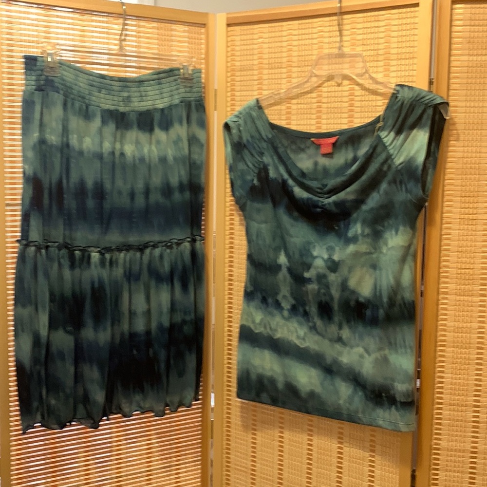 Blue tie-dyed outfit. Size medium top and size large skirt with elastic waist.